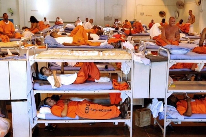 Inmates in bunk beds